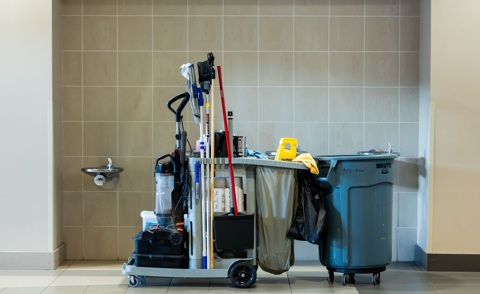 Cleaning cart stocked with professional cleaning tools